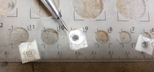 Judy Larson's Domed Stud with Drop Loop - , Metalwork, Cutting, Cutting Tool, Cutters, How To Punch Holes, Hole Punching, Punch A Hole, Stamping, Stamps, Butane Torch, Soldering, Solder, Center the template hole over the pin pad.